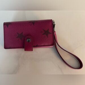 Coach Magenta Star Pattern Wristlet
6 in X 3 in